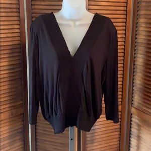 Smocked knit banded top in black